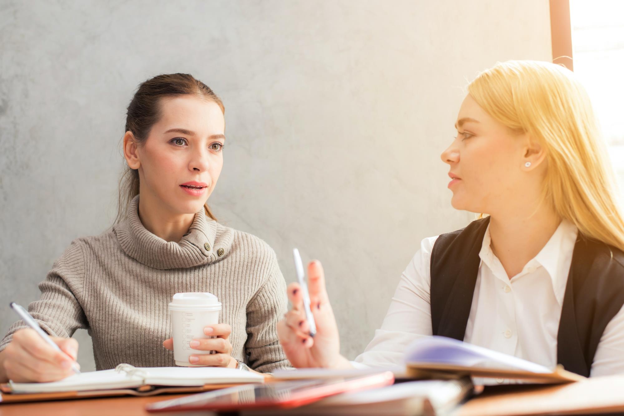 Two people talking