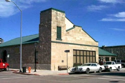 The sandstone fire station on the corner of Musser and Curry streets as it appears in 1999.  The words "Warren Engine Company No. 1" are still visable above the large window that was originally the garage door.  CCFD photo.